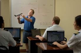 Instructor leading a classroom ground school session