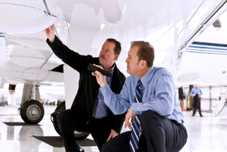 Pilots performing a preflight inspection